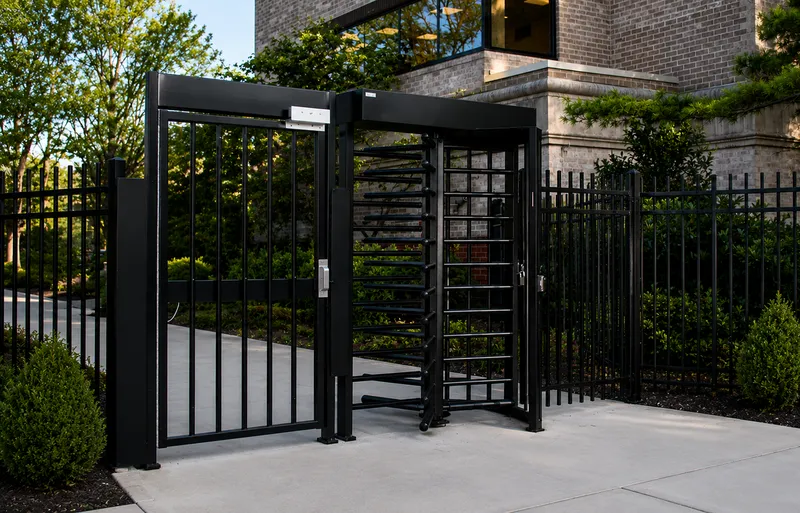 Boon Edam Turnlock full-height turnstile with side gate installation